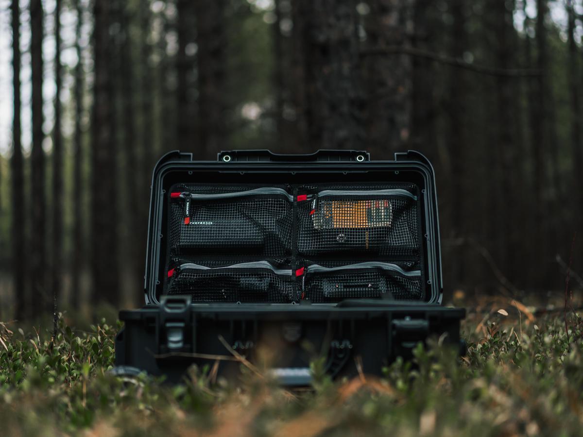 NANUK_935_case_with_Mesh_Lid_Organizer_zoom-in_in_the_forest
