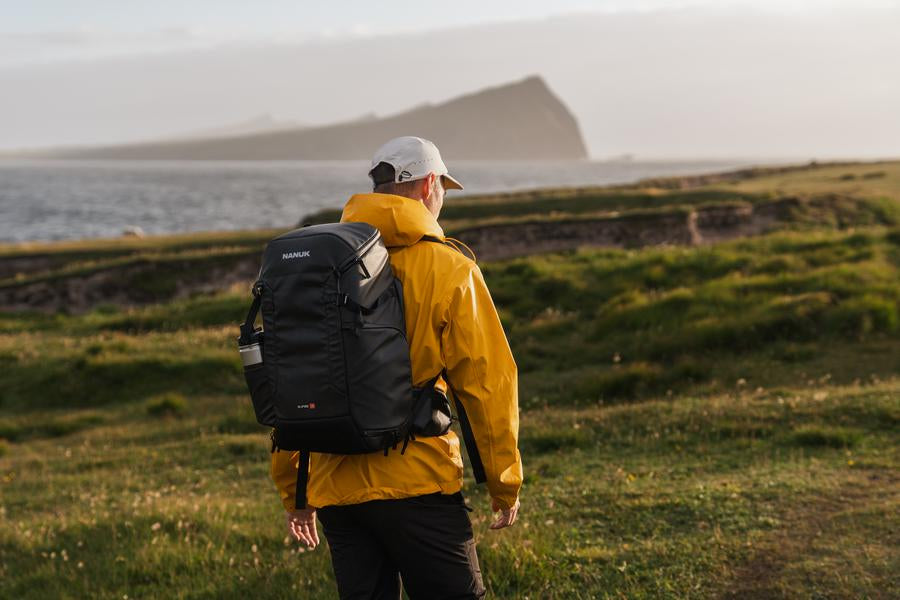 Photograph walking outdoor with the Nanuk N-PVD 30L backpack on his back