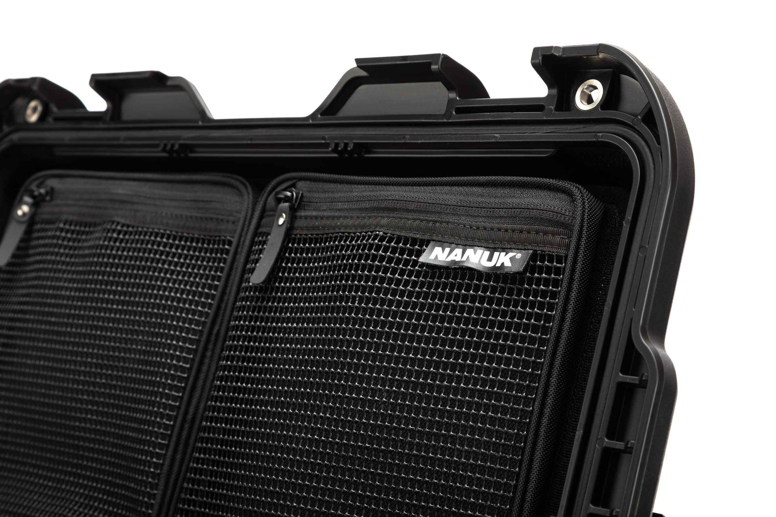 Black hard-shell suitcase with mesh side panel and visible Nanuk logo on a white background