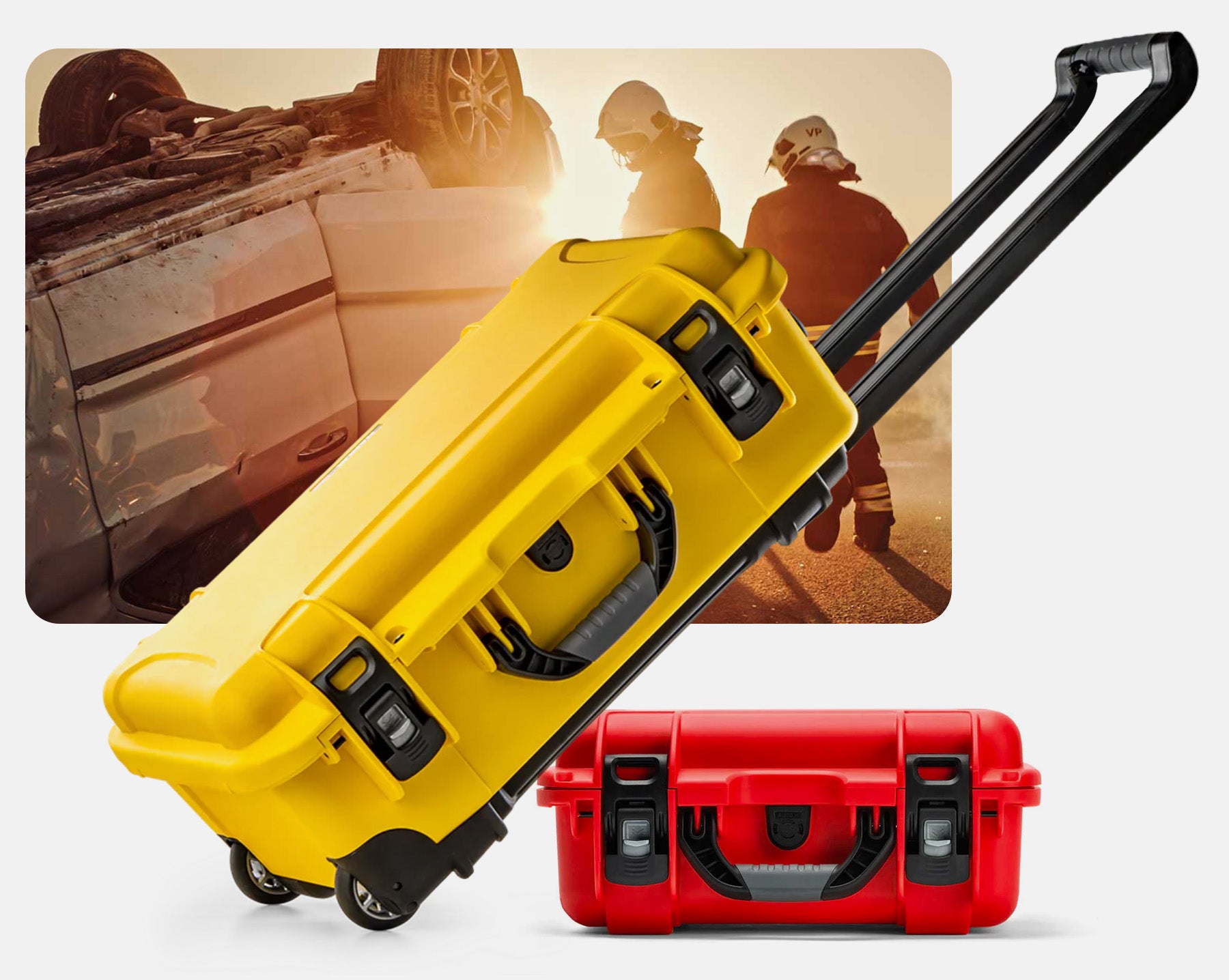 Nanuk 935 Yellow with pull handle extended and a smaller Nanuk orange case with a medical background