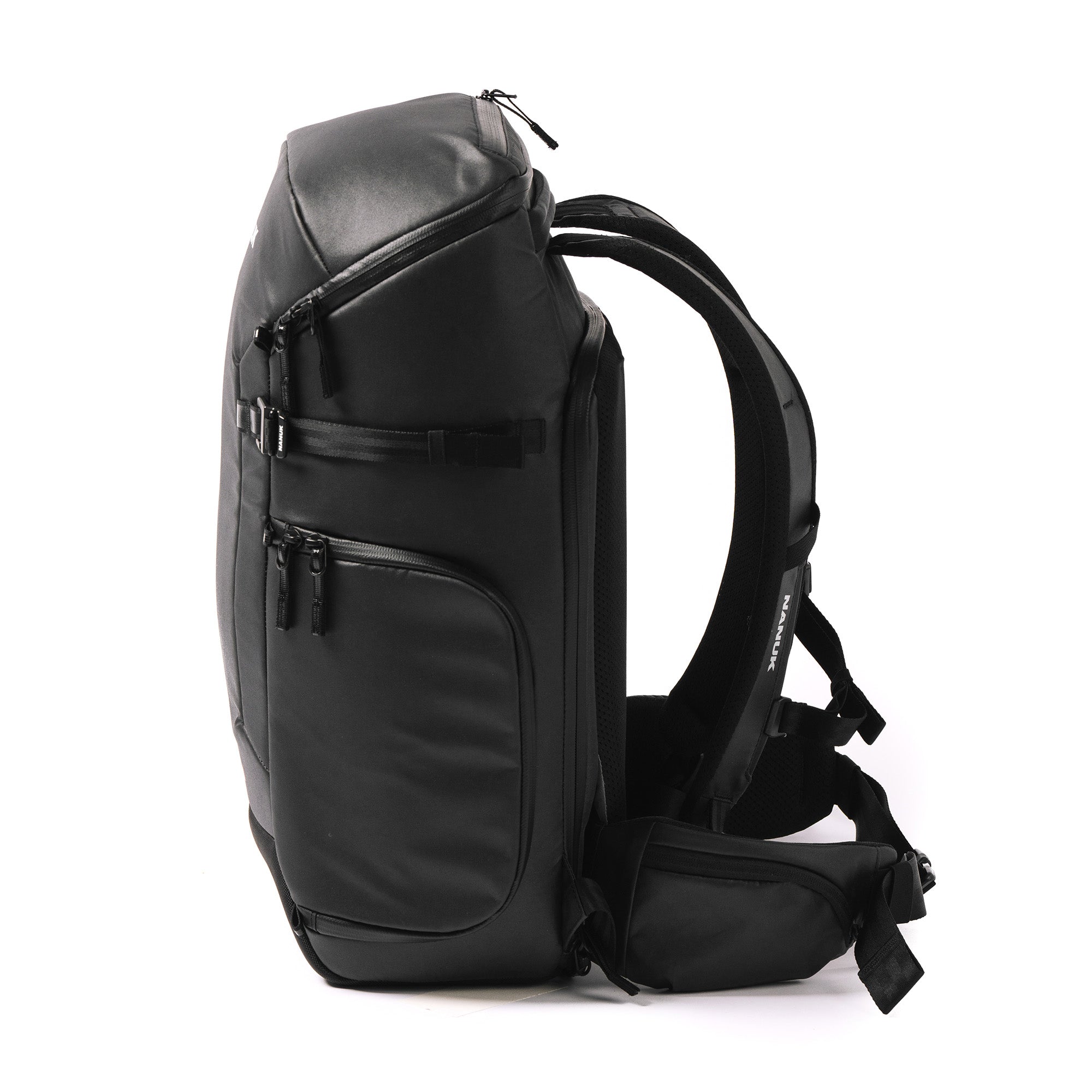 Side of a Black N-PVD 30L Camera Backpack from NANUK on a white background Side of a Black N-PVD 30L Camera Backpack from NANUK on a white background