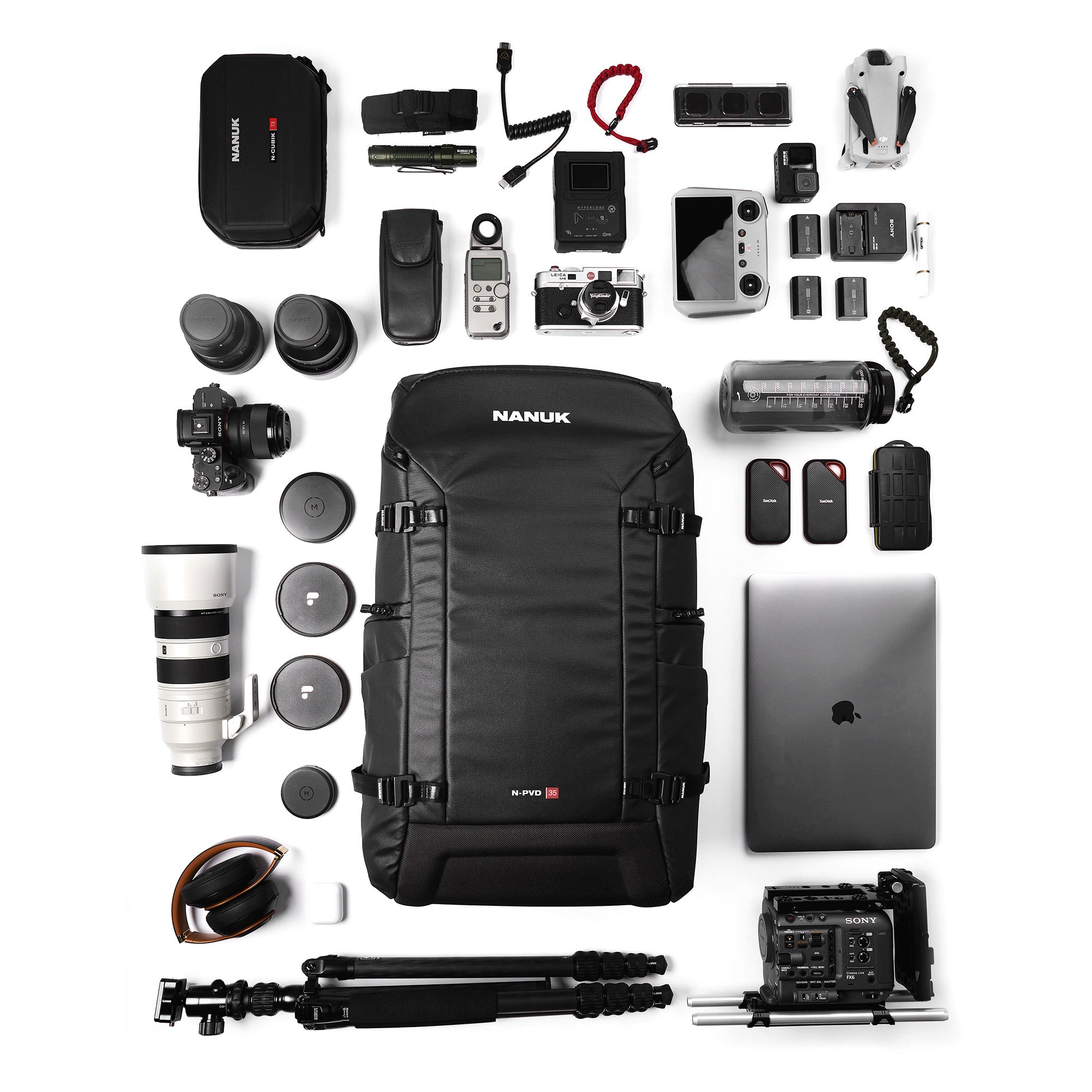 What fits inside a Black N-PVD 35L Camera Backpack from NANUK on a white background What fits inside a Black N-PVD 35L Camera Backpack from NANUK on a white background