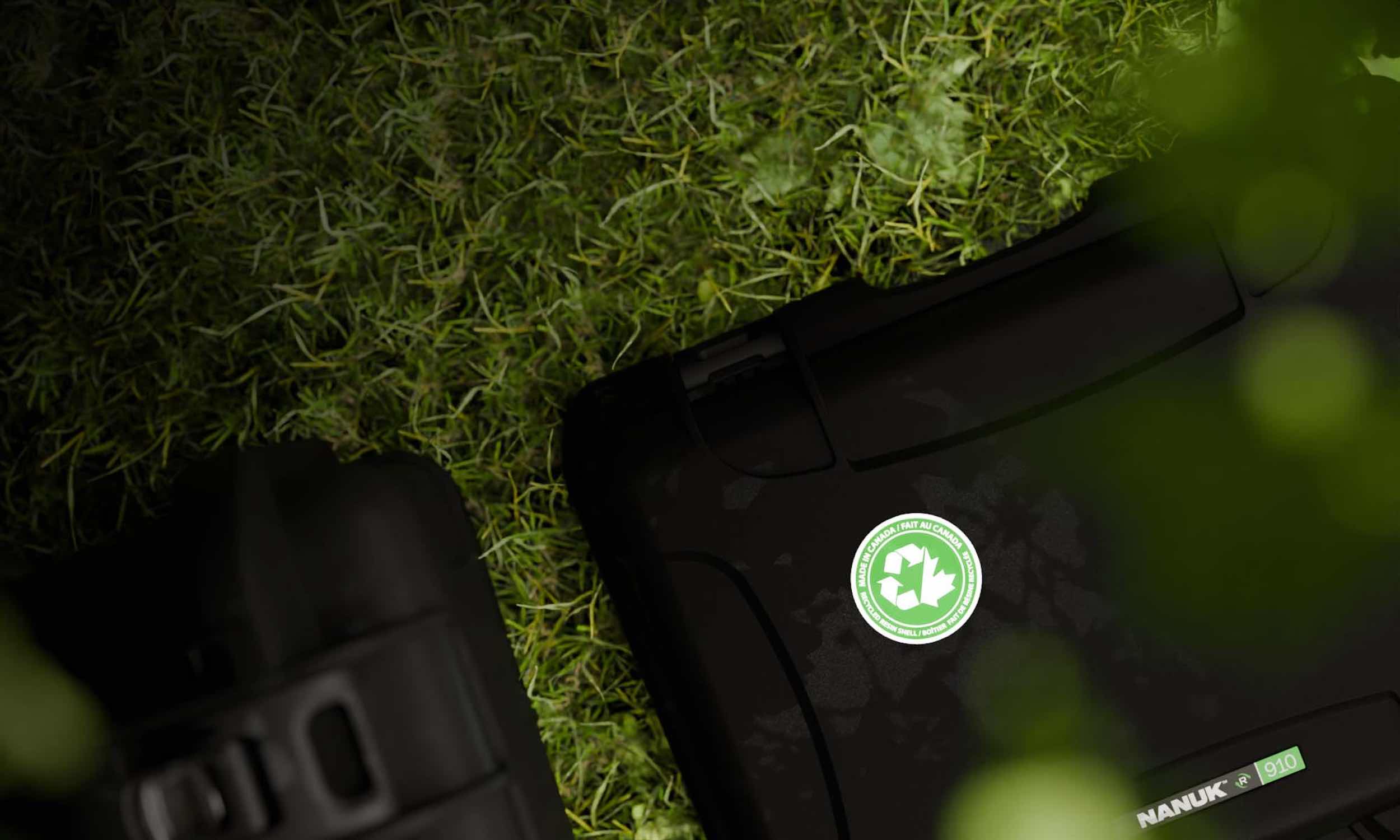NANUK hard cases on grass highlighting gear protection and eco-friendly packaging for resellers