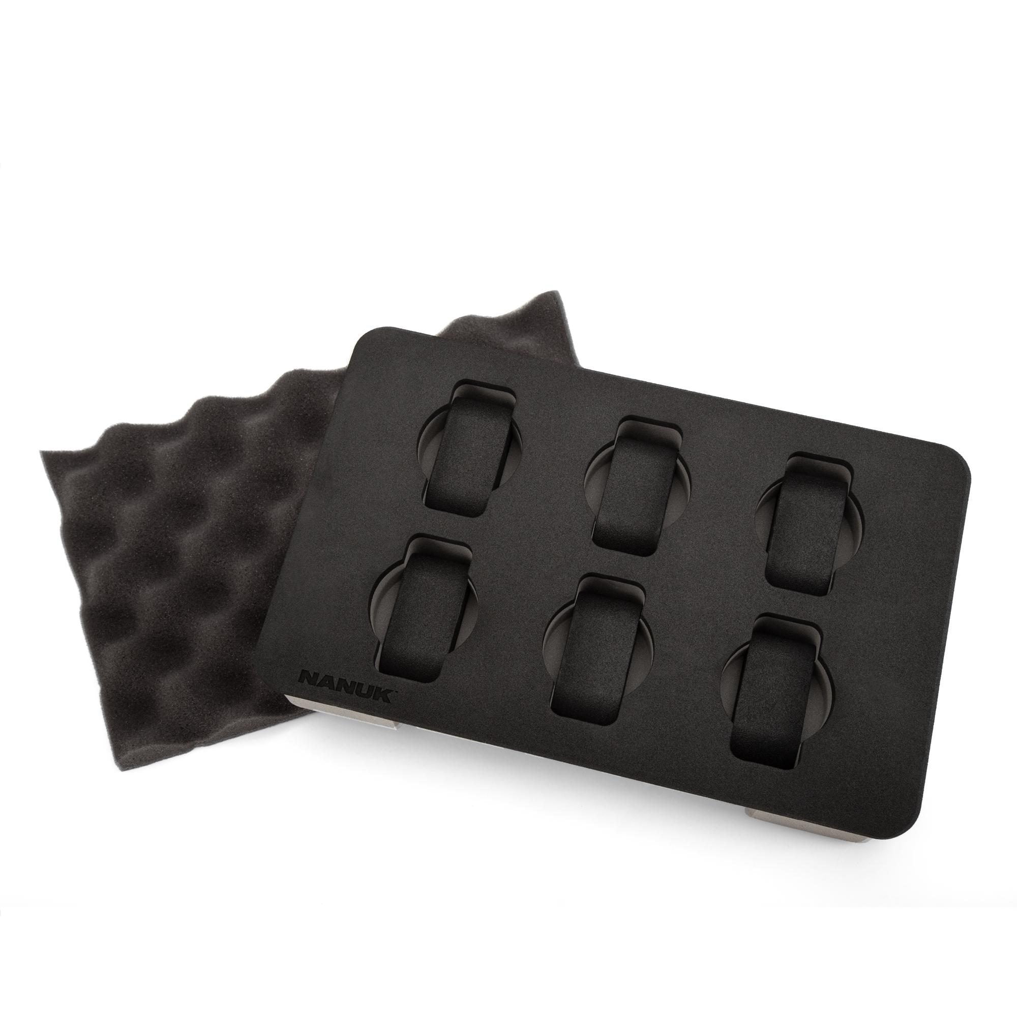 Black silicone mold with multiple cavity design on a white background