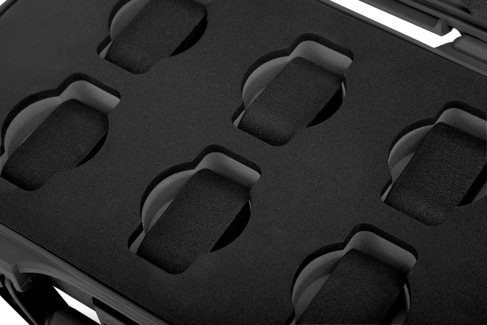 Black protective case with cutouts for a product, likely a phone or similar device.