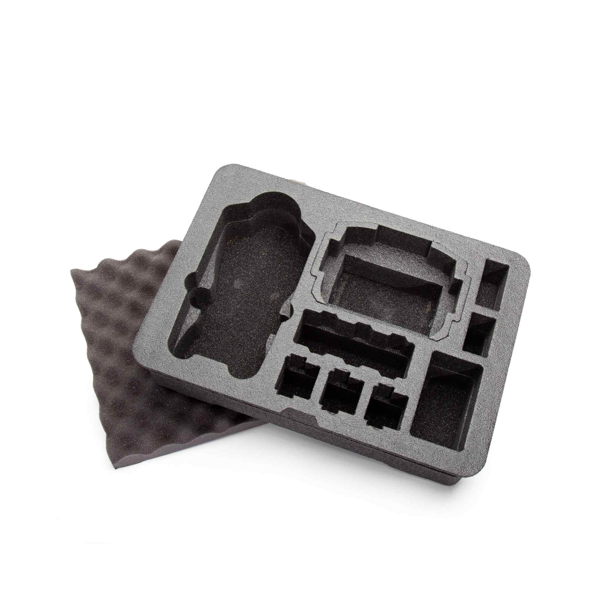 Gray foam tray with compartments on a white background