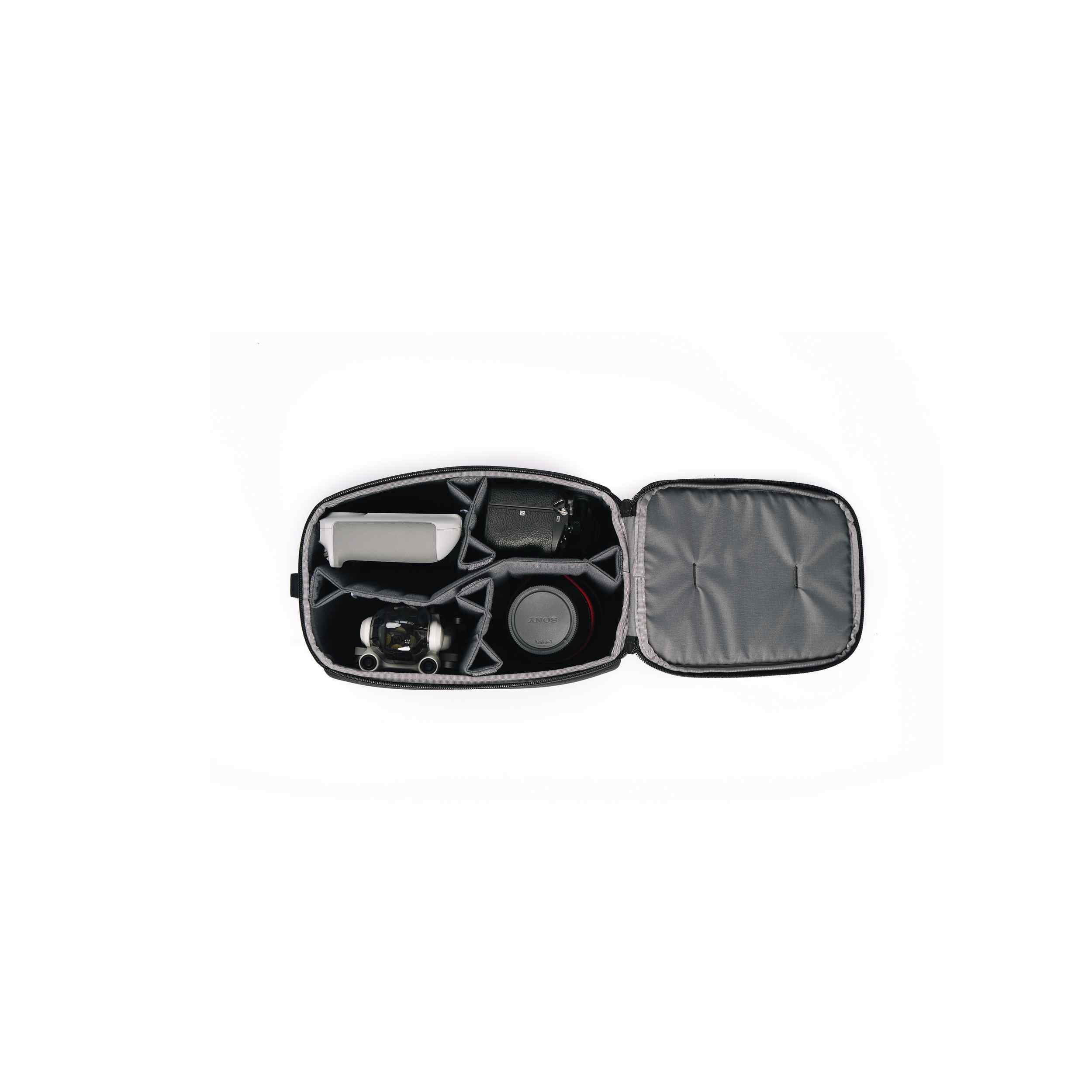 Black carrying case with open lid on a white background