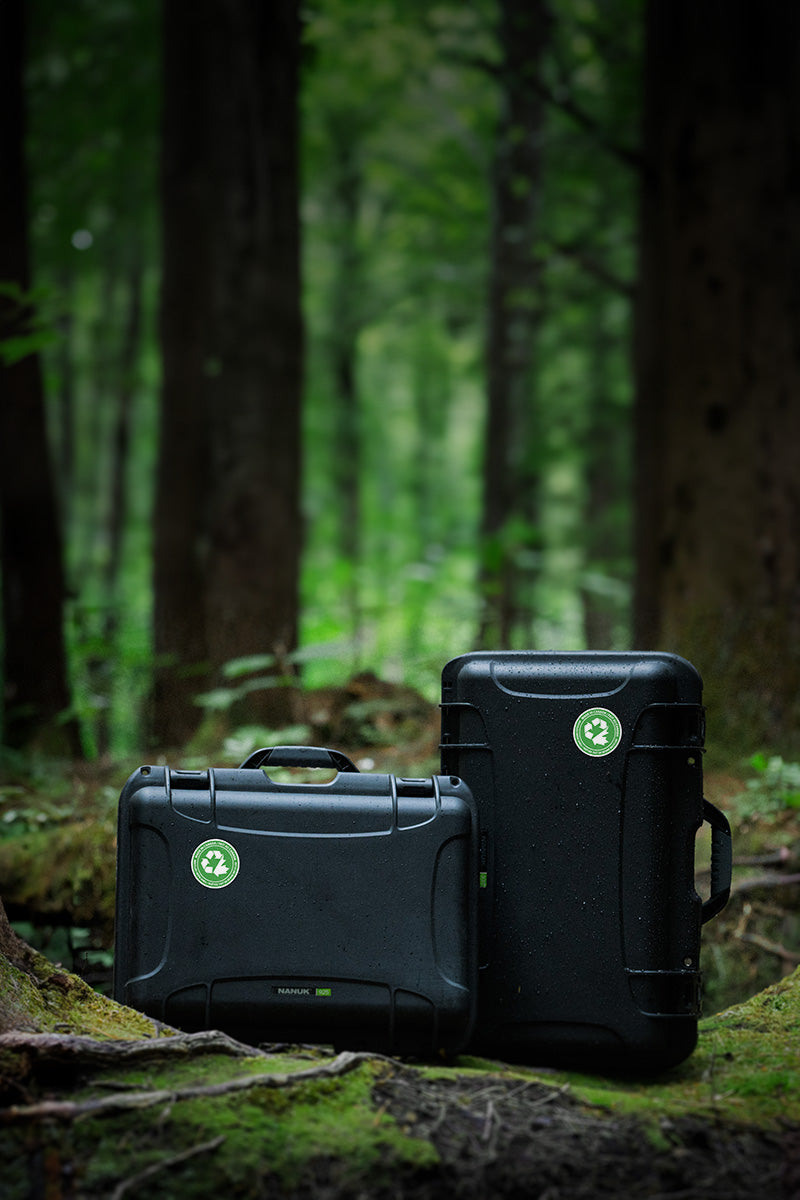 Two NANUK-R Cases in the middle of a green forest
